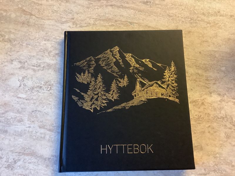 Hyttebok svart